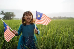 malaysian-kid-with-national-flag-scaled.jpg