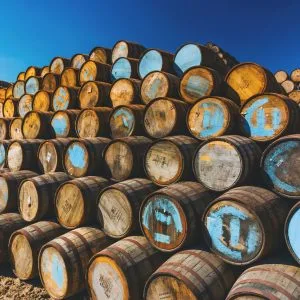 a large stack of barrels