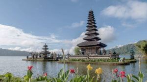 a photo in Bali on a partly cloudy day with a larger tower