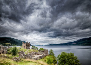 Urquhart castle on a dark cloudy day